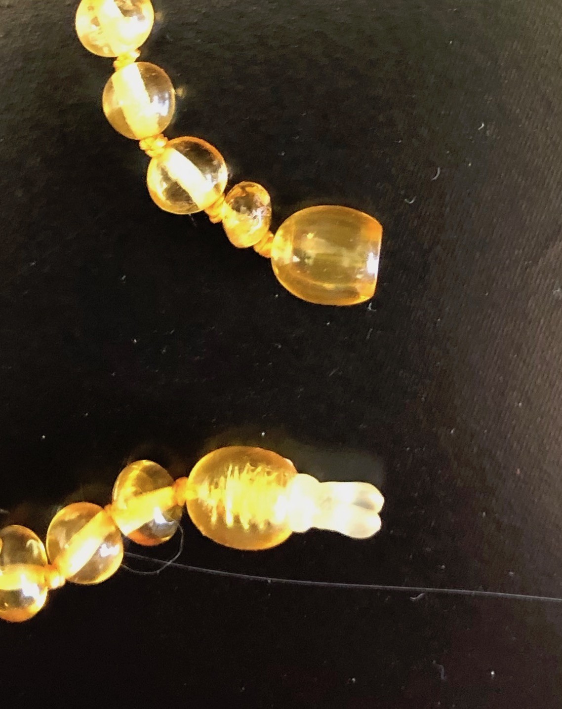 Collier Ambre Bébé avec coeur et fermoir sécurisé